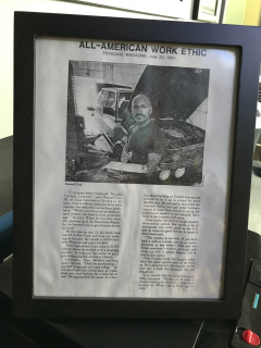 Framed Article About Former Shop Owner